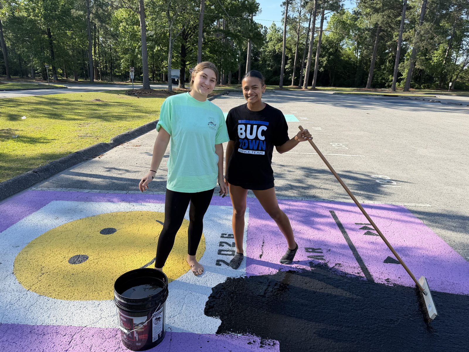 Laney NHS members with a painted senior parking spot