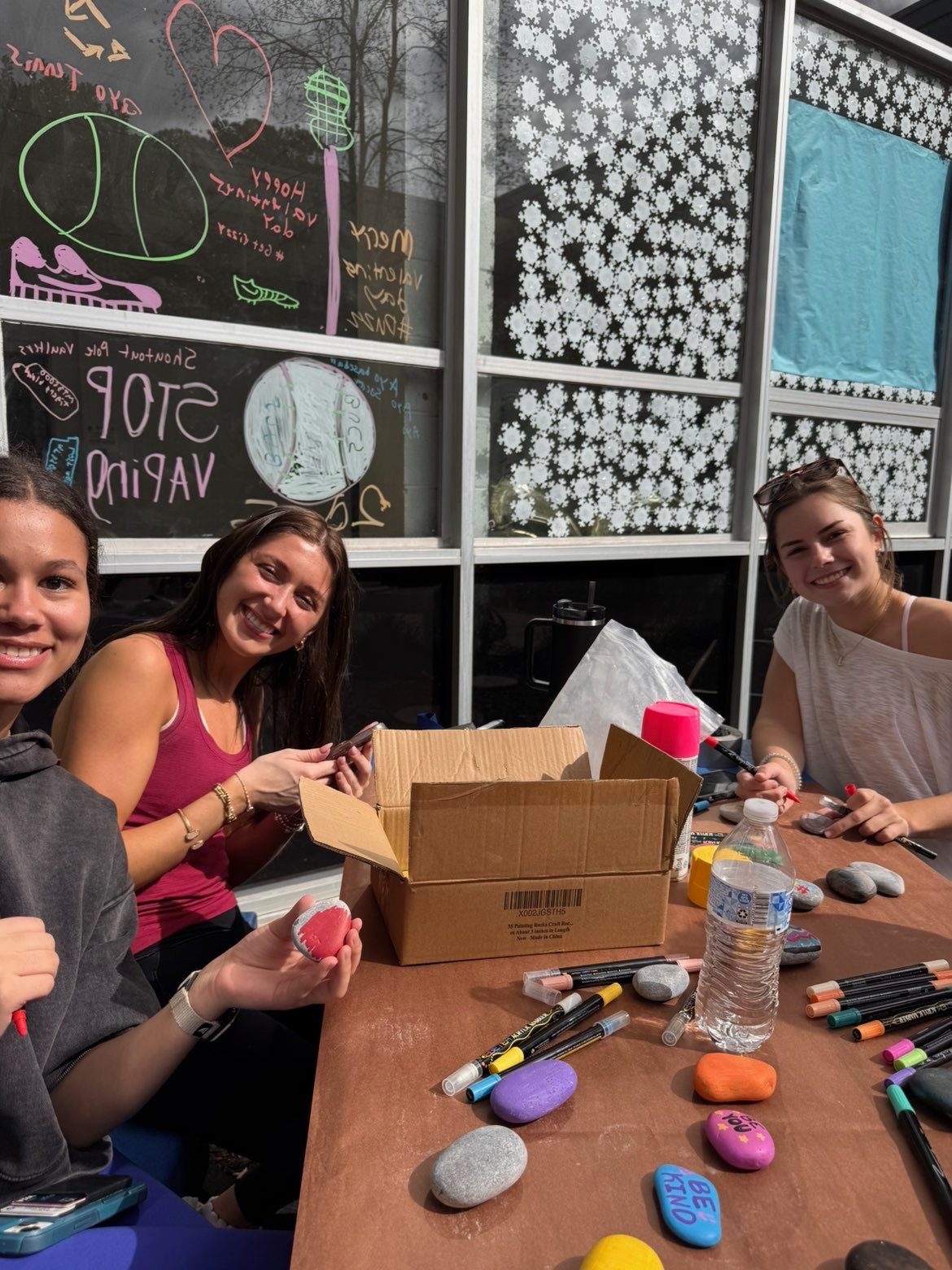 Laney NHS members painting rocks